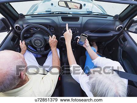 Senior couple in convertible car View Large Photo Image Stock Photo - Senior couple in convertible car. Fotosearch