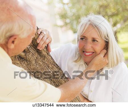 Picture - Senior couple in park. Fotosearch