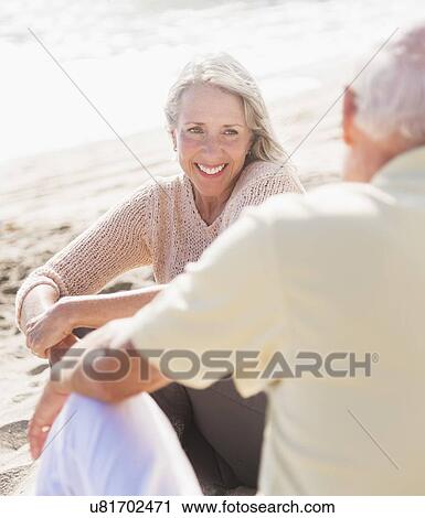 Senior couple on beach View Large Photo Image Stock Image - Senior couple on beach. Fotosearch