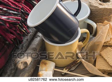 Stock Image - Studio Shot marshmallows, mugs and graham crackers. Fotosearch
