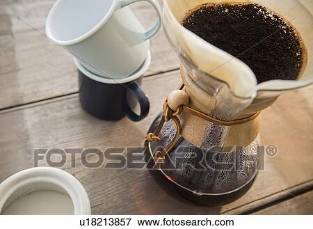 Stock Photo - Studio Shot of coffee pot and filter. Fotosearch