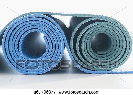 Studio Shot of exercise mats View Large Photo Image Stock Photo - Studio Shot of exercise mats. Fotosearch