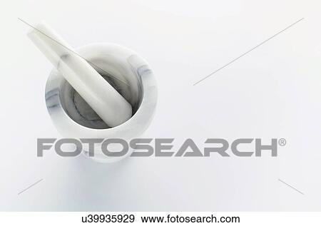 Stock Photo - Studio shot of mortar and pestle. Fotosearch