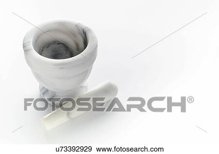 Stock Photo - Studio shot of mortar and pestle. Fotosearch