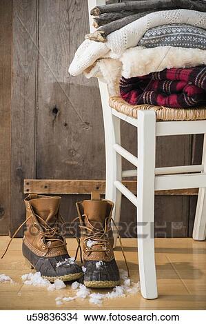Picture - Studio Shot of snow boots and folded blankets. Fotosearch
