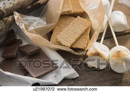 Stock Image - Studio Shot of toasted marshmallows, chocolate and graham crackers. Fotosearch