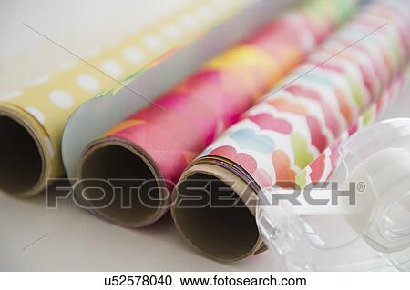 Stock Image - Studio Shot of wrapping paper and sticky tape. Fotosearch