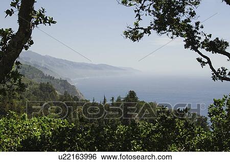 Stock Photograph - Tranquil coastline view. Fotosearch