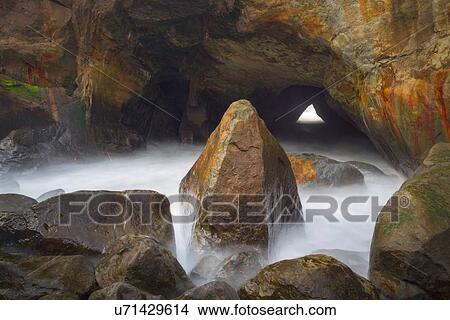 View of cave in sea View Large Photo Image Picture - View of cave in sea. Fotosearch