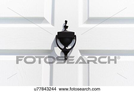 Picture - View of door knocker. Fotosearch