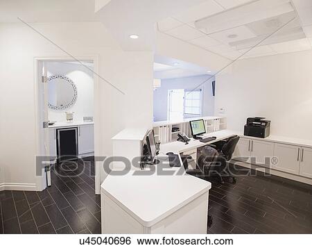 Stock Photograph - View of empty reception desk in clinic. Fotosearch