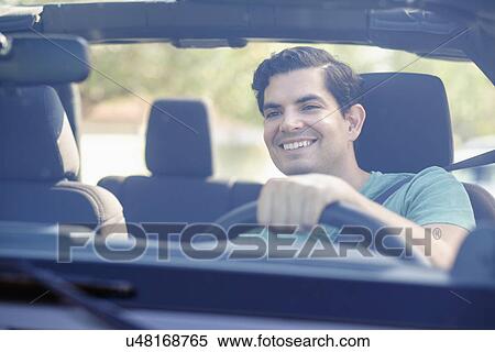 View of man driving car View Large Photo Image Stock Photography - View of man driving car. Fotosearch