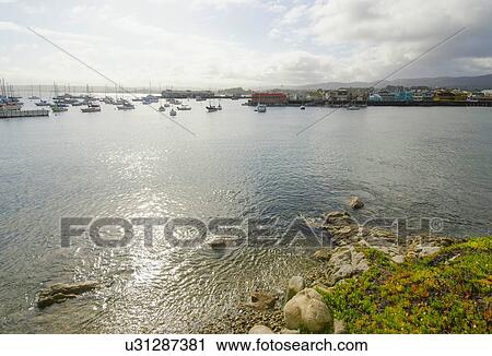 View of tranquil bay on sunny day View Large Photo Image Stock Image - View of tranquil bay on sunny day. Fotosearch