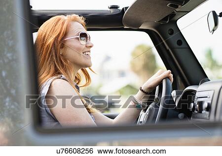 Woman sitting in car View Large Photo Image Stock Photograph - Woman sitting in car. Fotosearch