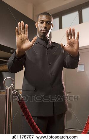A Bouncer In A Nightclub Stock Photo U81178707 Fotosearch