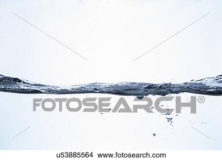 Above and below surface level still life view of clear water View Large Photo Image Picture - Above and below surface level still life view of clear water. Fotosearch