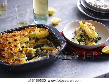 Baking tin and bowl serving of pasticcio View Large Photo Image Stock Image - Baking tin and bowl serving of pasticcio. Fotosearch