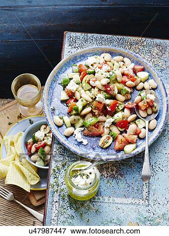 Bean, tomato and goats cheese salad View Large Photo Image Stock Photo - Bean, tomato and goats cheese salad. Fotosearch