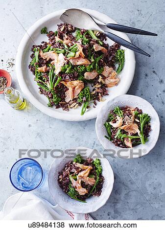 Black rice, salmon and broccolini View Large Photo Image Stock Photo - Black rice, salmon and broccolini. Fotosearch