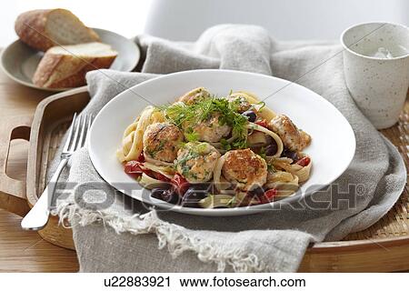 Bowl of linguine and salmon polpette with herb garnish View Large Photo Image Stock Image - Bowl of linguine and salmon polpette with herb garnish. Fotosearch