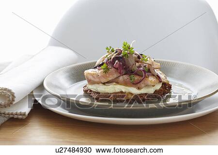 Bowl of salmon on potato roesti with herb garnish View Large Photo Image Stock Image - Bowl of salmon on potato roesti with herb garnish. Fotosearch