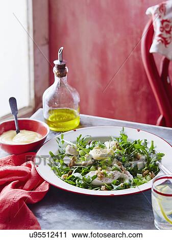 Stock Image - Chicken, walnut and mayonnaise salad. Fotosearch