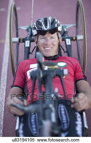 Stock Photography - Close up of cyclist in para-athletic training. Fotosearch