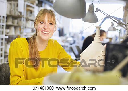 Female potter working in ceramic workshop View Large Photo Image Stock Image - Female potter working in ceramic workshop. Fotosearch