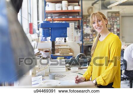 Female potter working in ceramic workshop View Large Photo Image Stock Image - Female potter working in ceramic workshop. Fotosearch