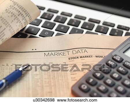 Stock Photo - Financial services, viewing financial markets for investing. Fotosearch