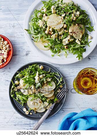 Fresh pear, blue cheese and hazelnut salad View Large Photo Image Picture - Fresh pear, blue cheese and hazelnut salad. Fotosearch