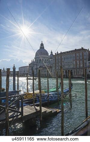 Gondolas on Grand Canal with a view of the church of Santa Maria Della Salute, Venice, Veneto, Italy View Large Photo Image Stock Photography - Gondolas on Grand Canal with a view of the church of Santa Maria Della Salute, Venice, Veneto, Italy. Fotosearch