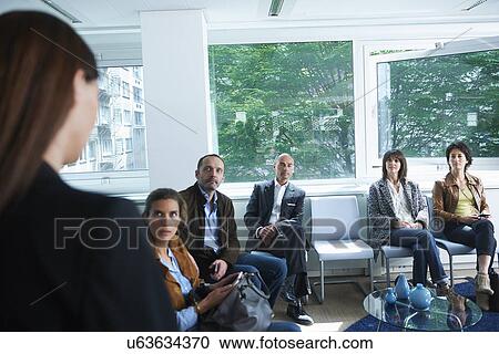 Stock Image - Group of people waiting for interview. Fotosearch