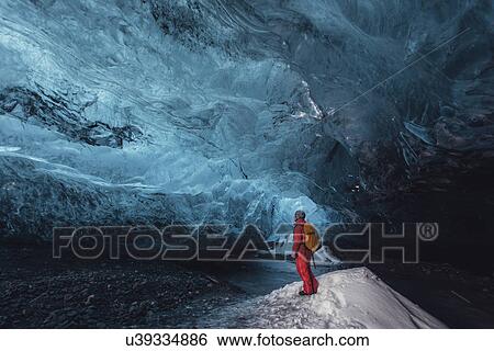 Man looking up in ice cave, Vatnajokull Glacier, Vatnajokull National Park, Iceland View Large Photo Image Stock Photograph - Man looking up in ice cave, Vatnajokull Glacier, Vatnajokull National Park, Iceland. Fotosearch