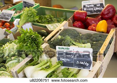 Stock Image - Markets stall crates with fruit and vegetable produce. Fotosearch