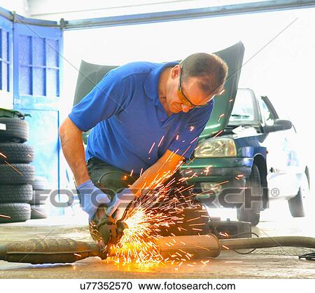 Mechanic cutting exhaust pipe with grinder View Large Photo Image Stock Image - Mechanic cutting exhaust pipe with grinder. Fotosearch