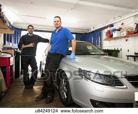 Mechanics in garage View Large Photo Image Picture - Mechanics in garage. Fotosearch