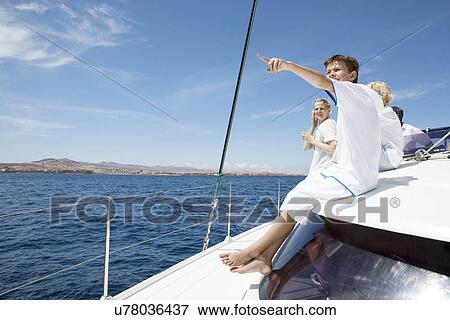 Parents and three sons sailing on catamaran near Fuerteventura, Spain View Large Photo Image Stock Photo - Parents and three sons sailing on catamaran near Fuerteventura, Spain. Fotosearch