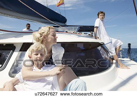 Parents and two sons sailing on catamaran near Fuerteventura, Spain View Large Photo Image Stock Photo - Parents and two sons sailing on catamaran near Fuerteventura, Spain. Fotosearch