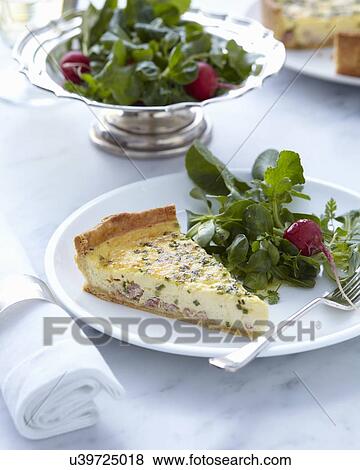 Plate with classic quiche slice and fresh salad View Large Photo Image Stock Photo - Plate with classic quiche slice and fresh salad. Fotosearch