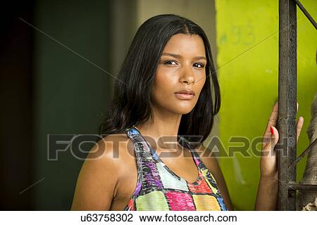 Portrait of sultry young woman, Favela Santa Marta, Rio de Janeiro Brazil View Large Photo Image Stock Image - Portrait of sultry young woman, Favela Santa Marta, Rio de Janeiro Brazil. Fotosearch