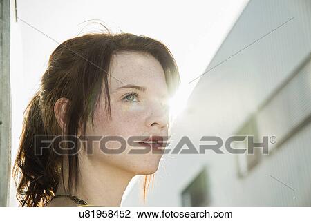 Portrait of sultry young woman on street View Large Photo Image Stock Image - Portrait of sultry young woman on street. Fotosearch