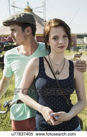Portrait of young couple at funfair View Large Photo Image Stock Photography - Portrait of young couple at funfair. Fotosearch