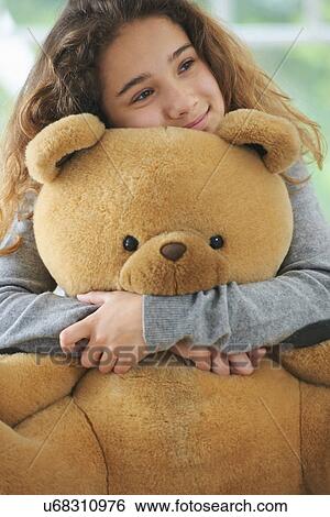 hugging teddy bear