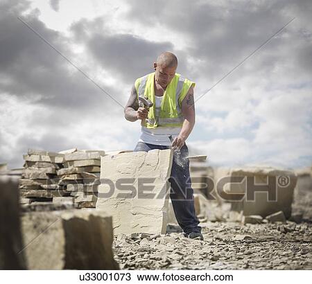 Quarry worker shaping sandstone in Yorkshire stone quarry View Large Photo Image Stock Image - Quarry worker shaping sandstone in Yorkshire stone quarry. Fotosearch