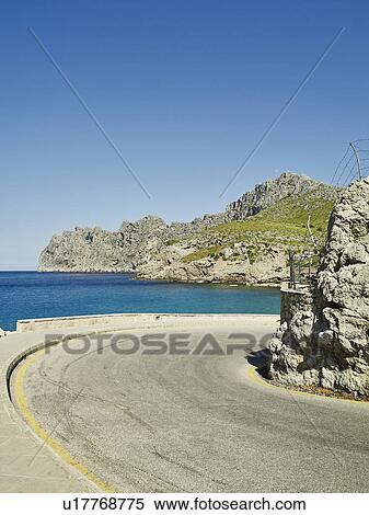 Stock Photography - Road on edge of coast, Majorca, Spain. Fotosearch