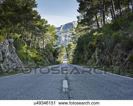 Stock Image - Road through mountains, Majorca, Spain. Fotosearch