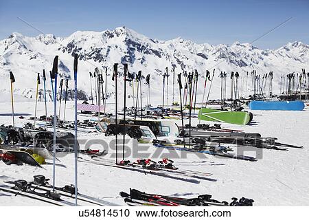 Rows of ski poles, skis and snowboards, Austria View Large Photo Image Stock Image - Rows of ski poles, skis and snowboards, Austria. Fotosearch