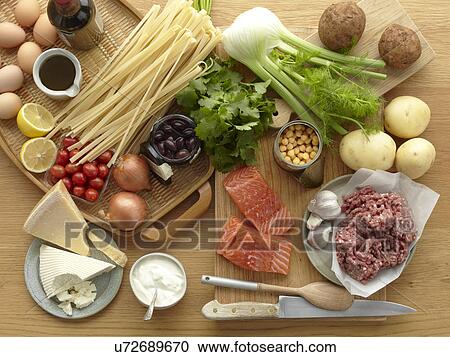 Selection of fresh raw foods with eggs, pasta, herbs, cheese, vegetables, salmon and minced pork View Large Photo Image Stock Image - Selection of fresh raw foods with eggs, pasta, herbs, cheese, vegetables, salmon and minced pork. Fotosearch