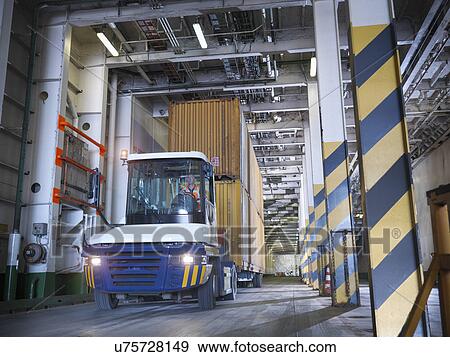 Shipping container loaded into ferry hold View Large Photo Image Stock Photo - Shipping container loaded into ferry hold. Fotosearch